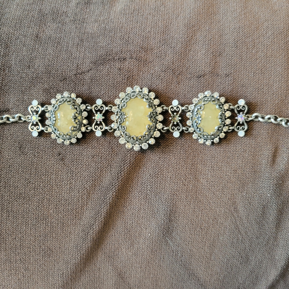Elegant Silver and Cream Bracelet